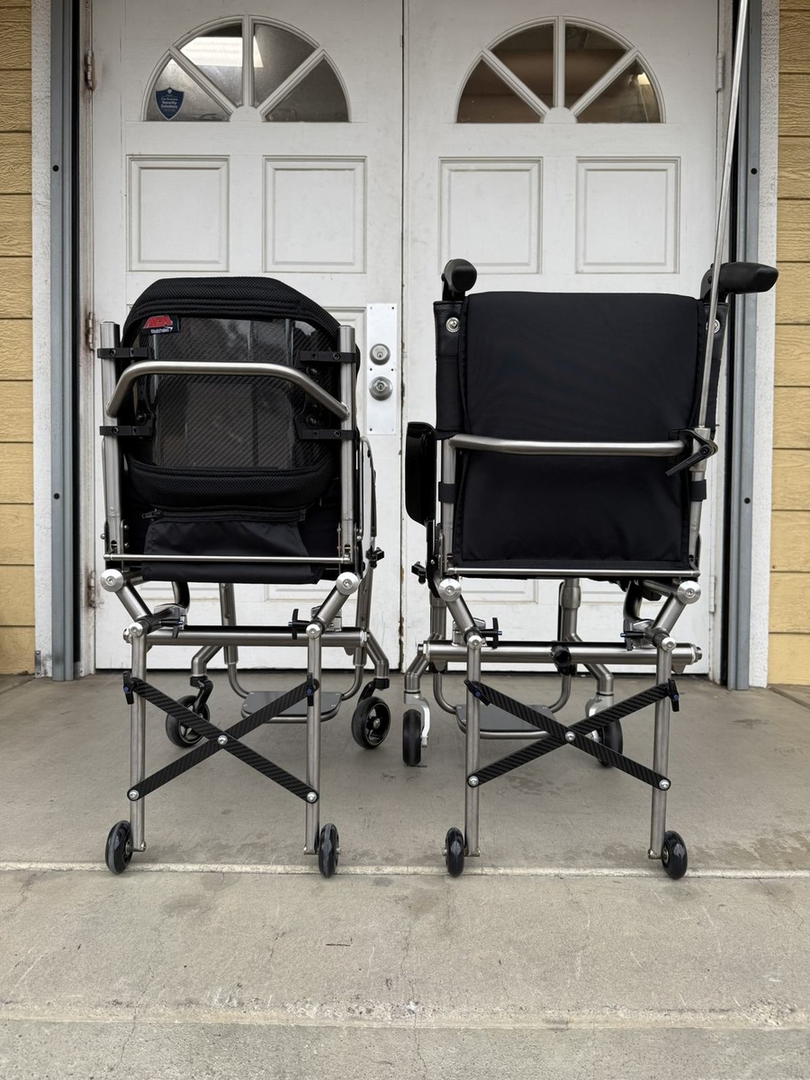 A travel-ready HOC wheelchair with folding or coupler features.